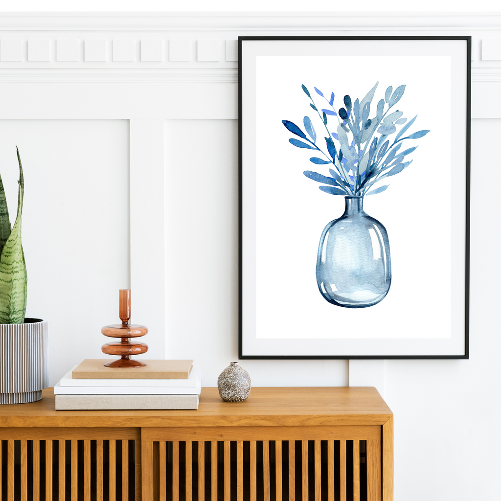 blue leaves in a vase wall art print by Wattle Designs in black frame