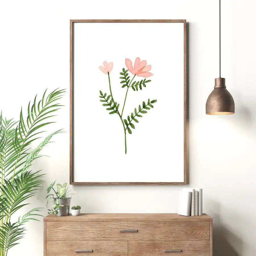 framed hallway print with single stem pink flower