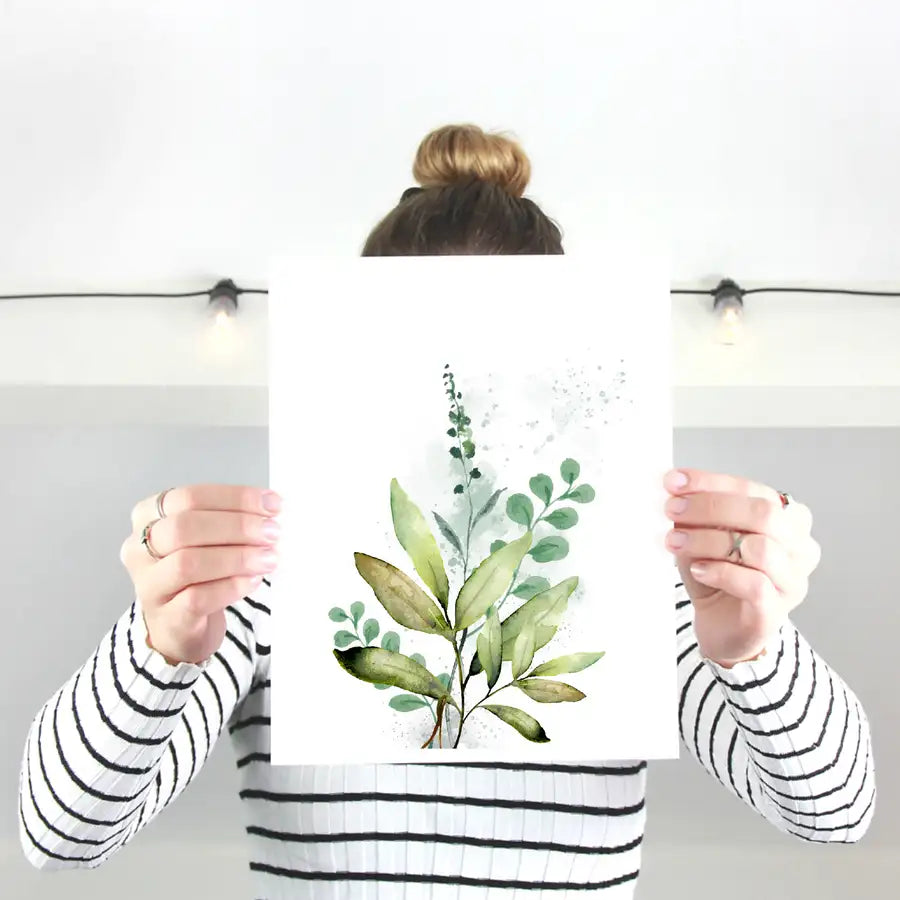 girl holding watercolour print by wattle designs