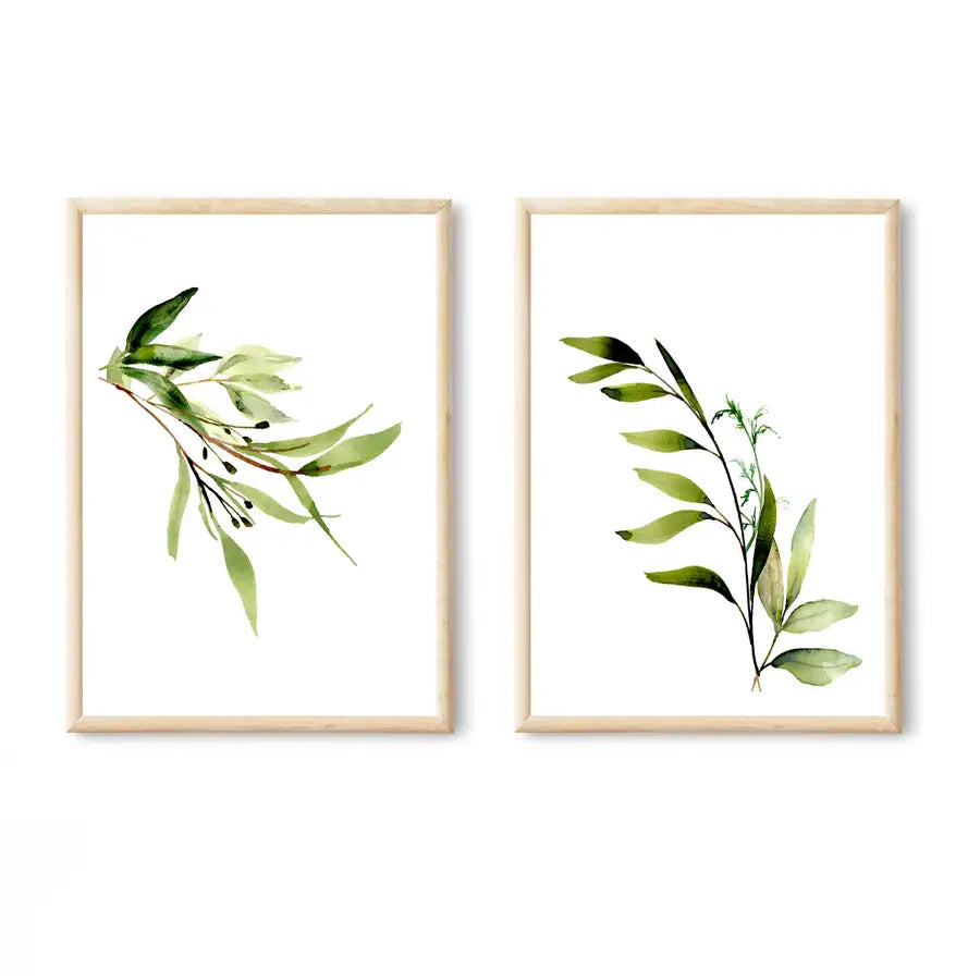 2 green watercolour leaf prints in oak frames